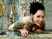 Tattooed alternative raven haired model Adahlia Diamante shows off tattooed body