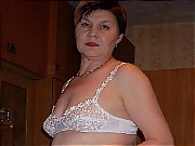 Amateur mature houswife is posing in lingerie and showing pussy