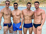 The two guys in speedos look much hotter than the guys wearing dork shorts right