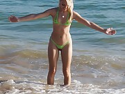 Hot Chloe Toy in her bikini runs along the shore