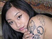 Amateur Asian Chick With Tattooed Pussy Modeling And Spreading Her Legs