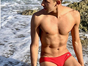 Seeing the cute young guys in red speedos made me so hard I had to cum.