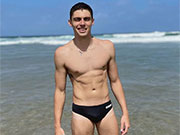 Beautiful day for hanging out at the beach with a cute speedo guy. 