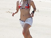 Avril Lavigne rocking a British Flag bikini to celebrate the Kings Coronation.