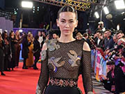 Jessica Henwick in a see through top at premiere