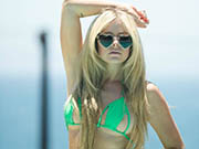 Avril Lavigne sexy in green bikini photoshoot
