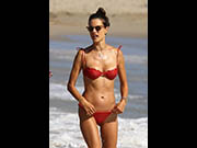 Alessandra Ambrosio in red bikini on the beach in Malibu