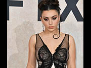 Charli XCX braless in see through dress at amFAR Gala Cannes 2022