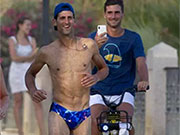 Tennis star Novack Djokovic in Speedos.  I think he looks great and keep it up!!