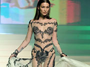 Bella Hadid runway braless in see through dress
